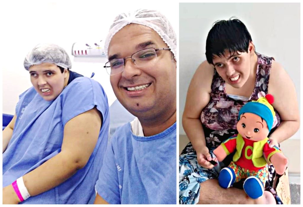 Bruna e Marcelo sorrindo com roupas cirúrgicas e touca antes do procedimento